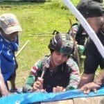 Jelang Misa Akbar, Satgas Yonif 310/KK Bersama Warga Gotong Royong Menyambutnya WhatsApp Image 2024 07 10 at 09.48.39