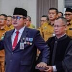 Terjerat Kasus Korupsi Proyek Jalan, Kadis PUPR Sumut Miliki Harta Nyaris Rp 5 Miliar topan ginting saat diambil sumpah jabatan sebagai pj sekda kota medan dok diskominfo medan 169